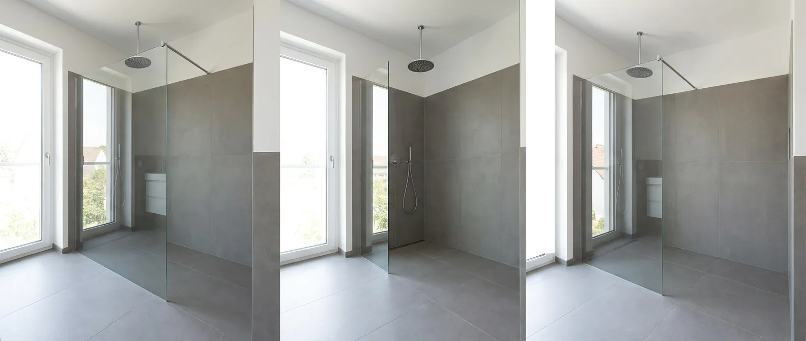 Douche à l'italienne terminée, paroi en verre et carrelage grand format